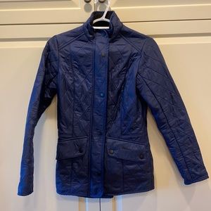 Women’s Navy Quilted Barbour jacket.